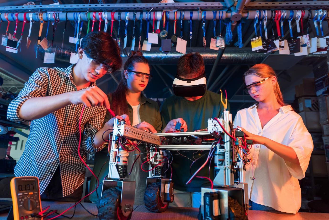 Students working on robotics and electronics project in semiconductor engineering lab