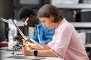 VLSI student practicing physical design with electronic components